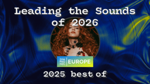 A woman with red hair and headphones is centered on a blue and yellow background with text: "Leading the Sounds of 2026," "SYMPHONIC EUROPE," and "2025 best of.