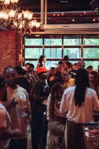 Music industry professionals networking at MUSEXPO in Burbank, California