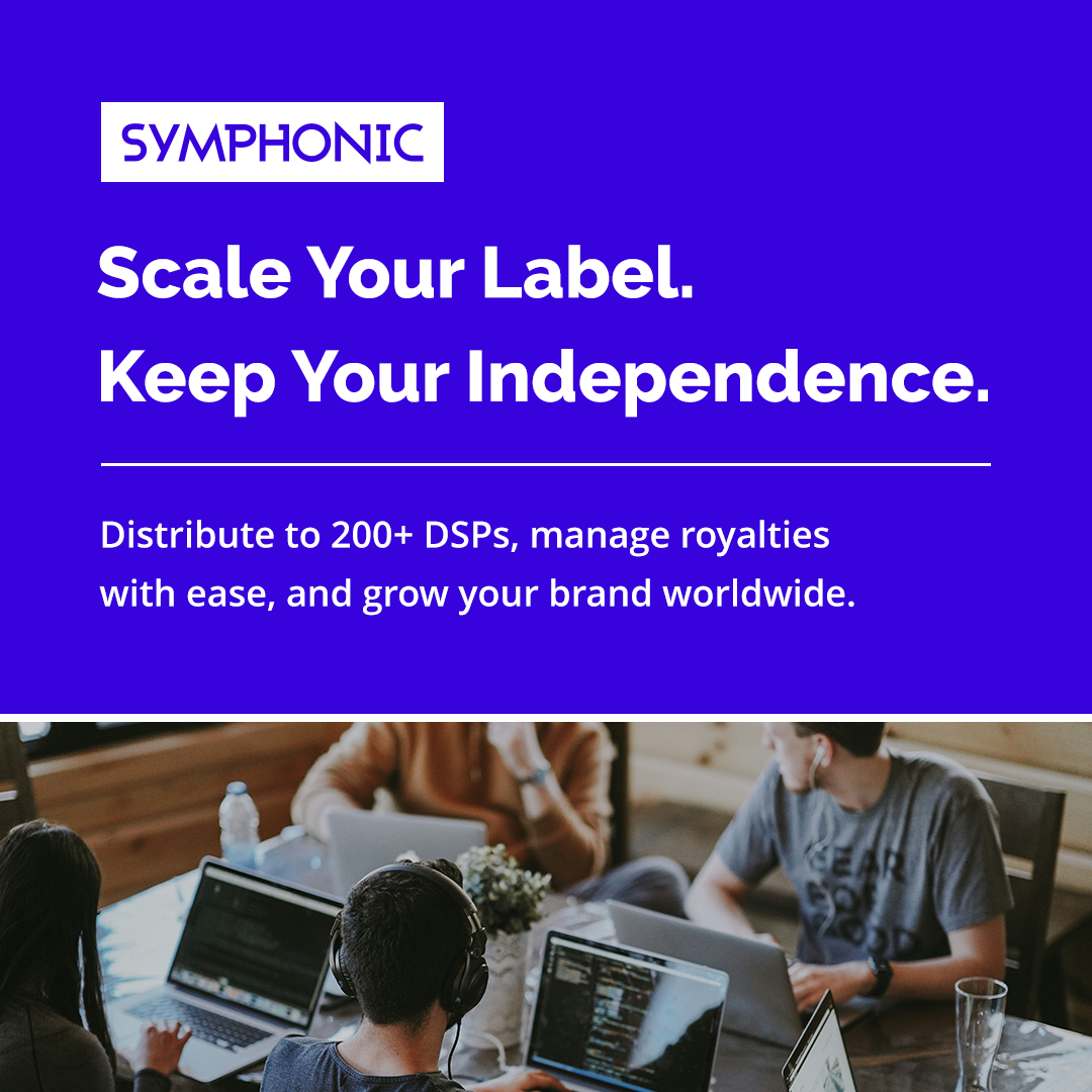 Yellow graphic with black text reading: "Two Decades In. Still Independent." Subtext explains Symphonic remains independently owned and supports indie labels. Partial view of people using devices at bottom.